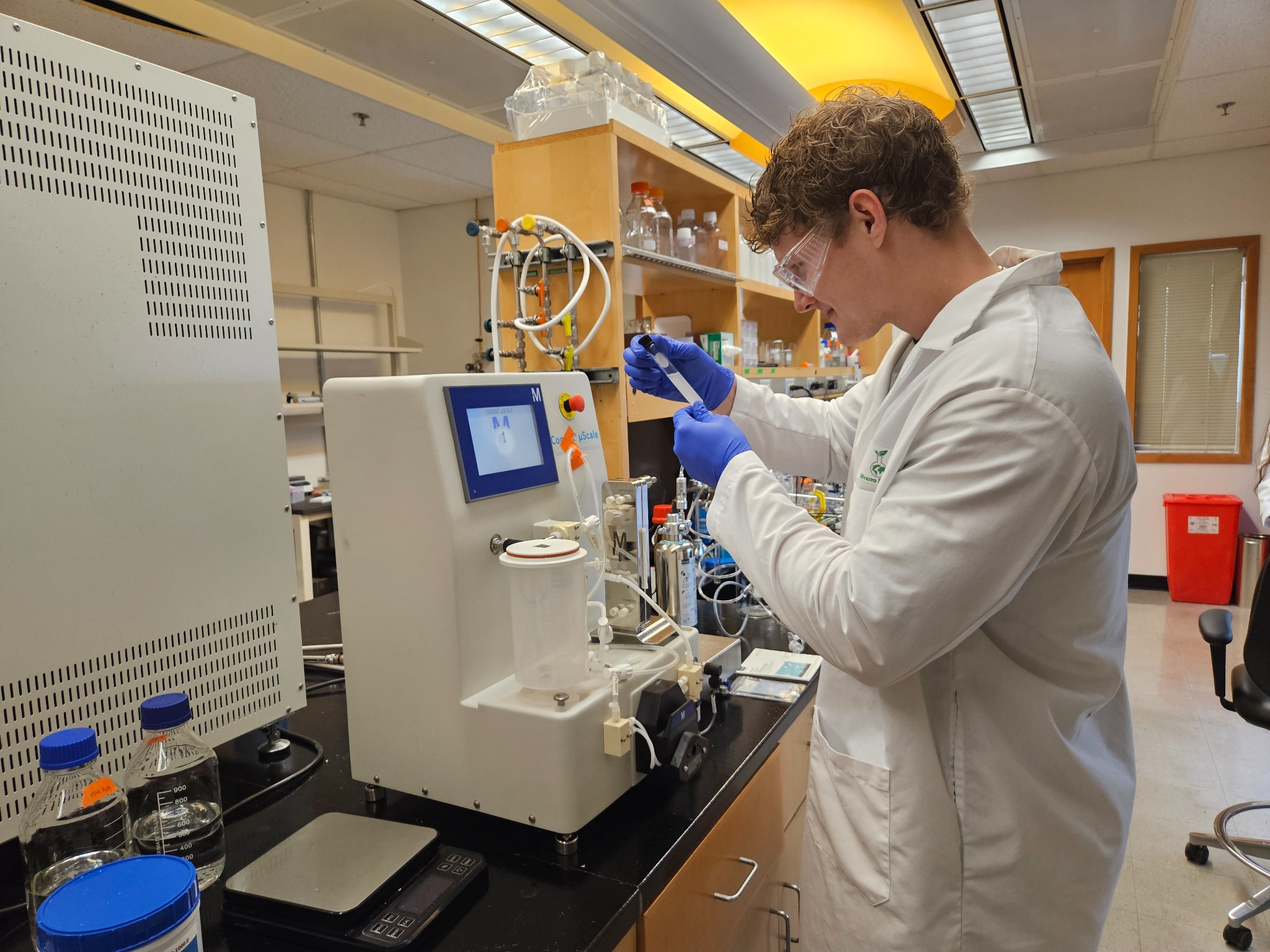 Mykito scientist evaluating an application-ready biomaterial sample